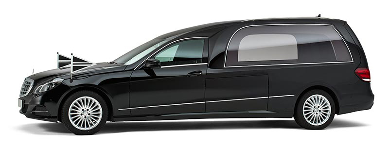 Zwarte staatsie met een Mercedes rouwauto in XL glas-uitvoering